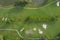 Aerial view putting green and beautiful turf golf course