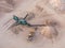 Aerial view of a quarry with conveyor belt and wheel loader - stones and sands for construction - top view , open pit mine, extrac