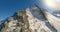 Aerial view raising flying over natural mountain summit sunny clear blue sky panorama landscape