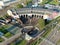 Aerial view of the reconstructed railway steam depot. Panoramic view of the urban landscape from the drone on a sunny day