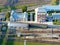 Aerial view of the reconstructed railway steam depot. Panoramic view of the urban landscape from the drone on a sunny day