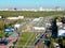 Aerial view of the reconstructed railway steam depot. Panoramic view of the urban landscape from the drone on a sunny day