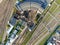 Aerial view of the reconstructed railway steam depot. Panoramic view of the urban landscape from the drone on a sunny day