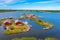 Aerial view of red timber boat houses at Svedjehamn in Finland