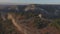 Aerial view on remains of an ancient observation tower in the mountains. Shot. Watch tower of the ancient city in the