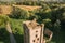 Aerial View Remains Of Yastrzhembsky Estate And Park Complex. Top View Of Old Five-storey Brick Water Tower. Drone View