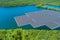 Aerial view of renewable alternative electricity energy the floating solar panels cell platform on the beautiful lake
