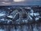 Aerial view of residental complex Novogorsk Olympic village in the evening at sunset. River like a border, beautiful