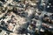 Aerial view of a residential area with houses completely destroyed by an earthquake or by a military air raid, made with