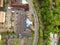 Aerial view of residential city houses and parking in the yard