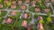 Aerial view of residential houses at spring. neighborhood, suburb. Real estate, drone shots, sunset, sunlight, from above