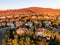 Aerial view of residential modern subdivision during sunset