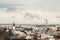 Aerial view of Reykjavik from Perlan, snow capped mountains in winter, Iceland