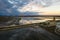 Aerial view of rice fields, flocks of birds and agricultural machinery during sunset on Lake Albufera. Comunidad