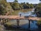 Aerial view of a rickety wooden bridge.