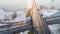 Aerial view of Riga elevated road junction and interchange overpass at winter sunset time
