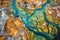 aerial view of river delta with colorful mineral deposits