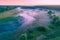 Aerial view of the river in early misty morning