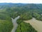 Aerial view river forest nature woodland area green tree, Top view river lagoon pond with blue water from above, island green