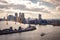 Aerial view of River Thames, North Greenwich and the Docklands on a cloudy day in London, England