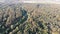 Aerial view of Riverbed Between Pine Forest. River near Tops of Green Trees