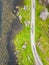 Aerial view of road and lake at Gap of Dunloe with rocks and vegetation