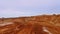 Aerial view of road to industrial territory sand mine. Sand mining process