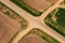 Aerial view of roadway and dirt road intersection