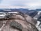 aerial view rock with medieval castle Ehrenburg near moselle river Brodenbach white winter snow wonderland forest hills