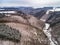 aerial view rock with medieval castle Ehrenburg near moselle river Brodenbach white winter snow wonderland forest hills