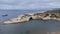 aerial view of the rock of S\\\'Archittu di Santa Caterina in the province of Oristano, Sardinia, Italy