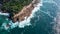 aerial view of the rocks against which the powerful waves of the Indian Ocean break
