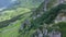 Aerial view of rocky peak of Spitz mountain in the Carpathian mountains, landscape of summer mountains