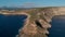 Aerial view rocky shoreline and tranquil Mediterranean sea