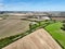 an aerial view of rolling countryside in Dorset