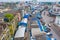 Aerial view of Rom Hoop market. Thai Railway with a local train run through Mae Klong Market in Samut Songkhram Province, Thailand