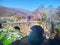 Aerial view of the Roman bridge of Cuartos del Losar de la Vera, Extremadura. Cuartos Bridge with the Sierra de Gredos in the