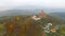 Aerial view on romantic fairy castle Bouzov in autumn landscape. Moravia, Czech republic.