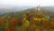 Aerial view on romantic fairy castle Bouzov in autumn landscape. Moravia, Czech republic.