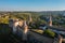 Aerial view of the romantic stone medievel castle on top of the mountain