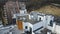 Aerial view roof of a multi-storey building on which communications and ventilation systems are installed. Roofs of high