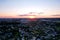 Aerial view of the roofs of country modern houses. Cottages, townhouses and line houses. Modern residential complex. Realtor and