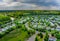 Aerial view roofs of the near a river town houses East Brunswick in the urban landscape of a small sleeping area New