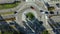 Aerial view of the roundabout. The cars moving on the roundabout