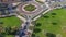 Aerial view of a roundabout circle road in Dubai downtown from above time-lapse. Dubai, United Arab Emirates.