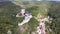 Aerial view on royal castle Karlstejn medieval, state owned castle near Prague in spring nature, lit by evening sun