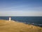 Aerial view of Rubjerg Knude lighthouse buried in sands on the coast of the North Sea