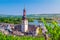 Aerial view of Rudesheim am Rhein historical town centre with clock tower spire of St. Jakobus catholic church