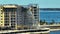 Aerial view of ruined by hurricane Ian construction scaffolding on high apartment building site in Port Charlotte, USA