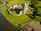 Aerial view of the ruins of the 12th century Ogmore Castle, Wales